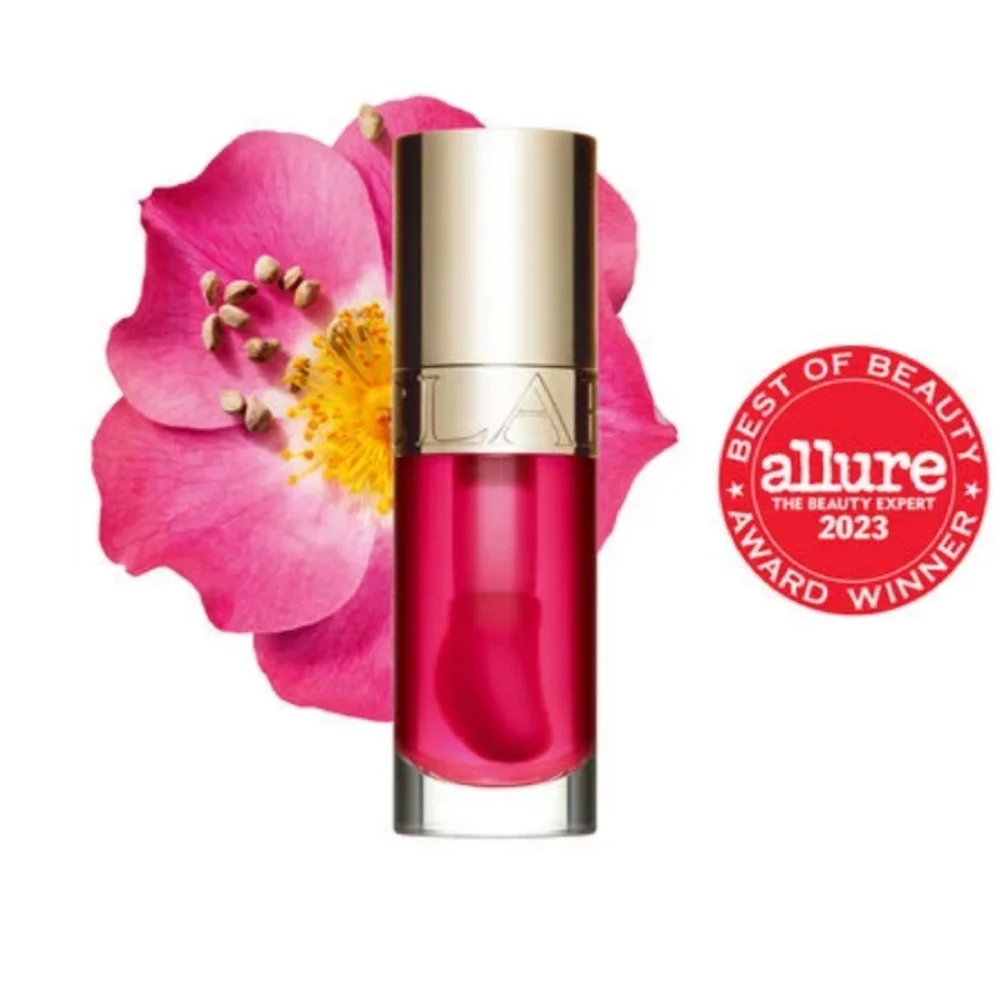 DELUXE CLARINS 04 LIP COMFORT OIL WITH SWEETBRIAR ROSE OIL.